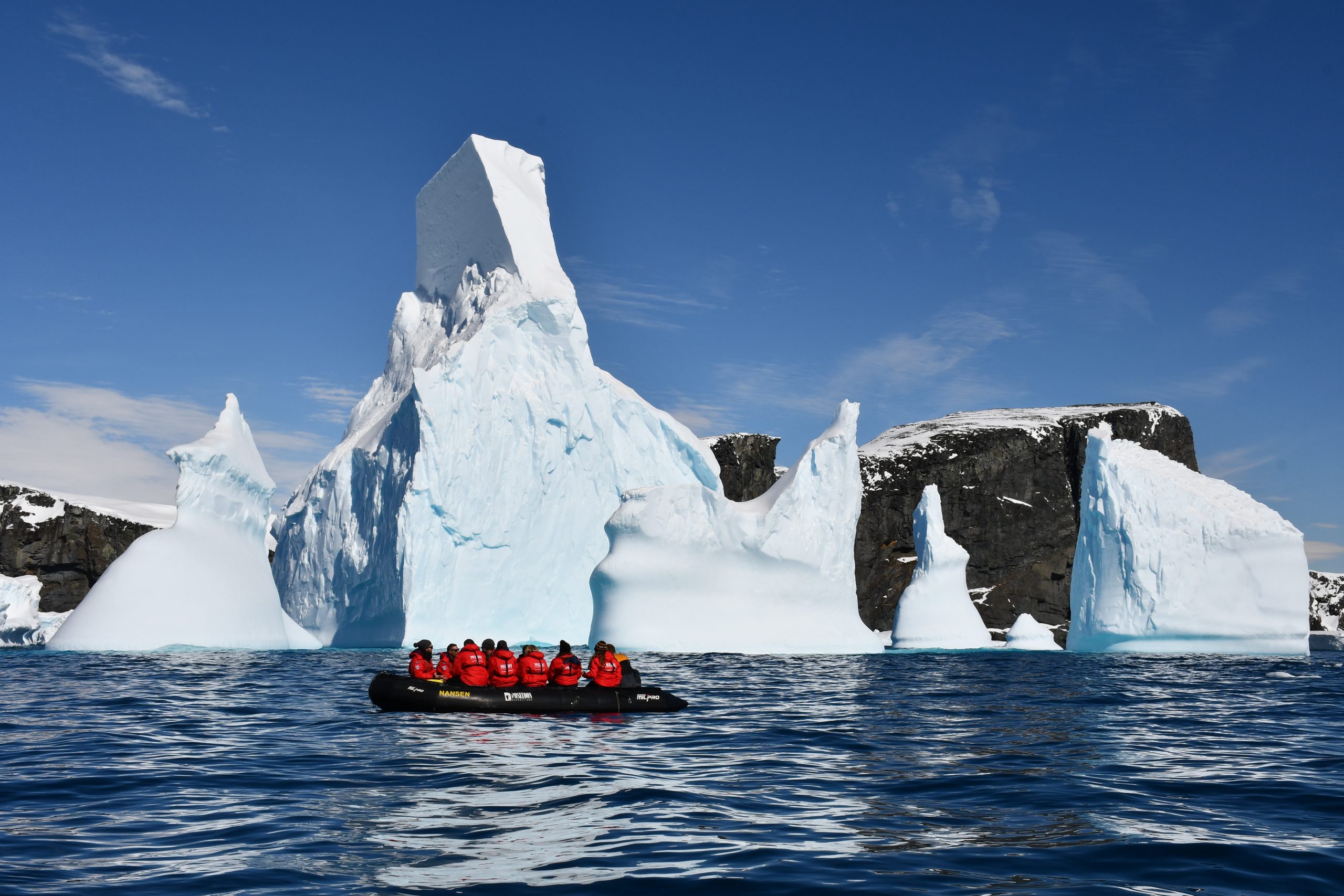 Zodiac cruising through icebergs 